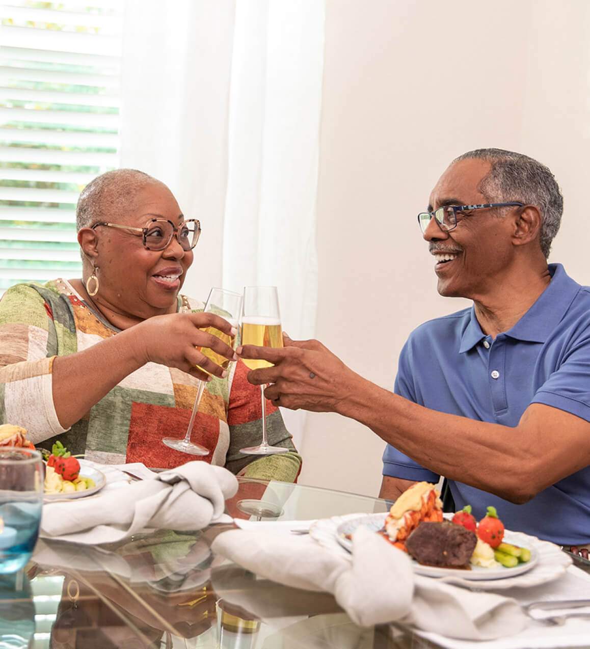 couple drinking wine with dinner
